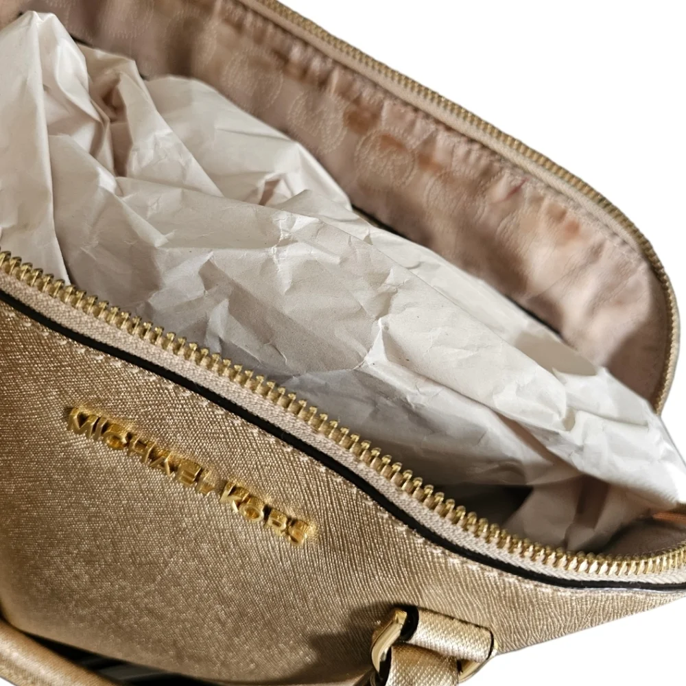 Michael Kors Gold Bag with removable shoulder crossbody strap.